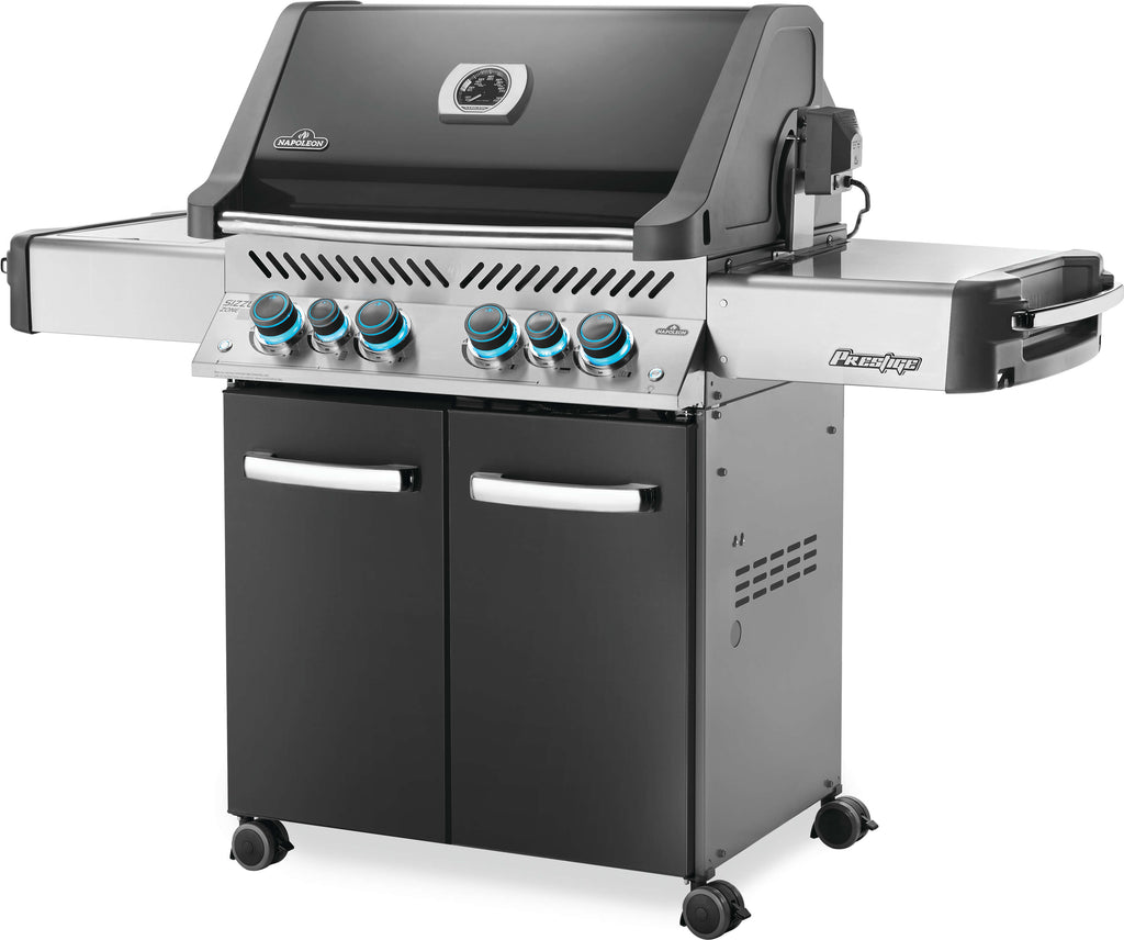 Front angle view of the charcoal grey napoleon prestige 500 RSIB barbecue. Available in stainless steel, black, or charcoal grey, these grills are quality made with many features.