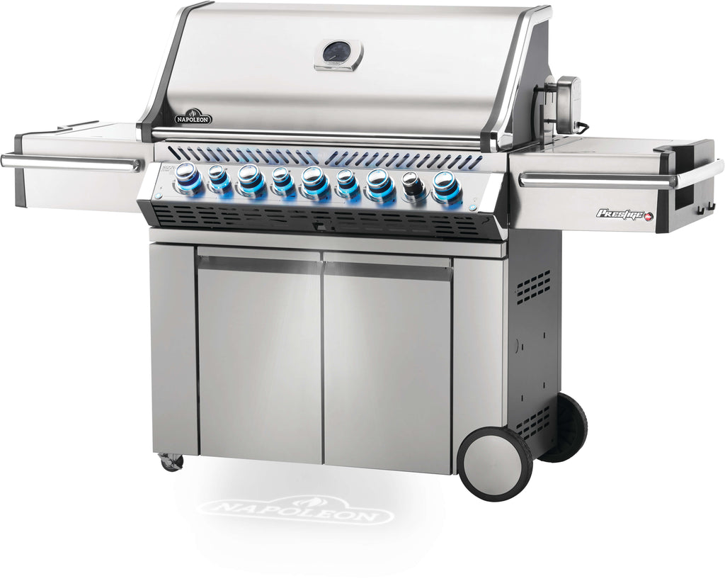 Closed angled front view of the Napoleon Prestige Pro 665 barbecue - high quality build, professional grade control, and sized for the whole family, these barbcues are top of the line and are a luxury addition for any backyard or cottage. Impress your guests with your grill and grilling game.