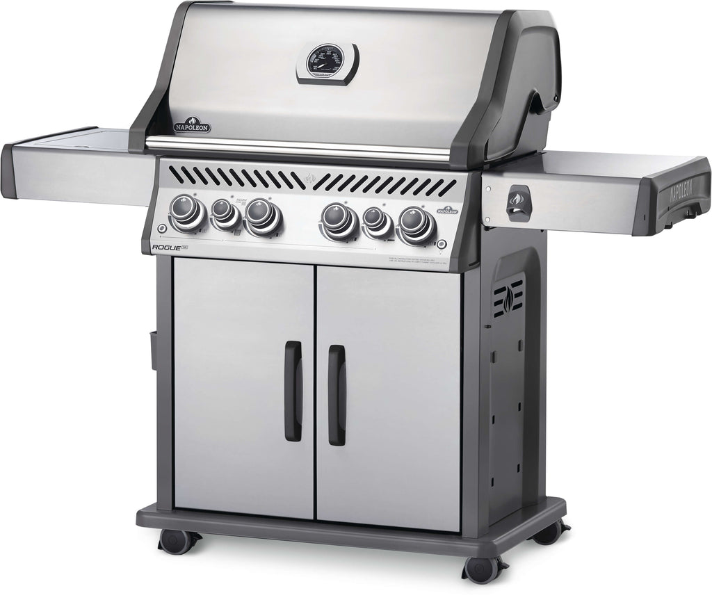 Front angle view of the Napoleon Rogue SE 525 RSIB Gas Barbecue. Stainless steel and available in natural gas or propane models, these grills are luxurious and have many features, such as 4 main burners, space saving folding side shelves, large infrared sizzle zone side burners, rear infrared rotisserie burners, and large cooking surfaces, fitting more than 30 burgers at once. Family sized and great quality.